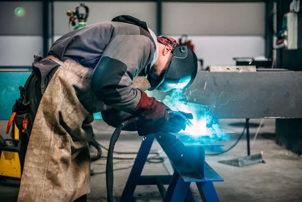 Welding Fume Extractor Filtering Out Smoke While Technician working on a Job
