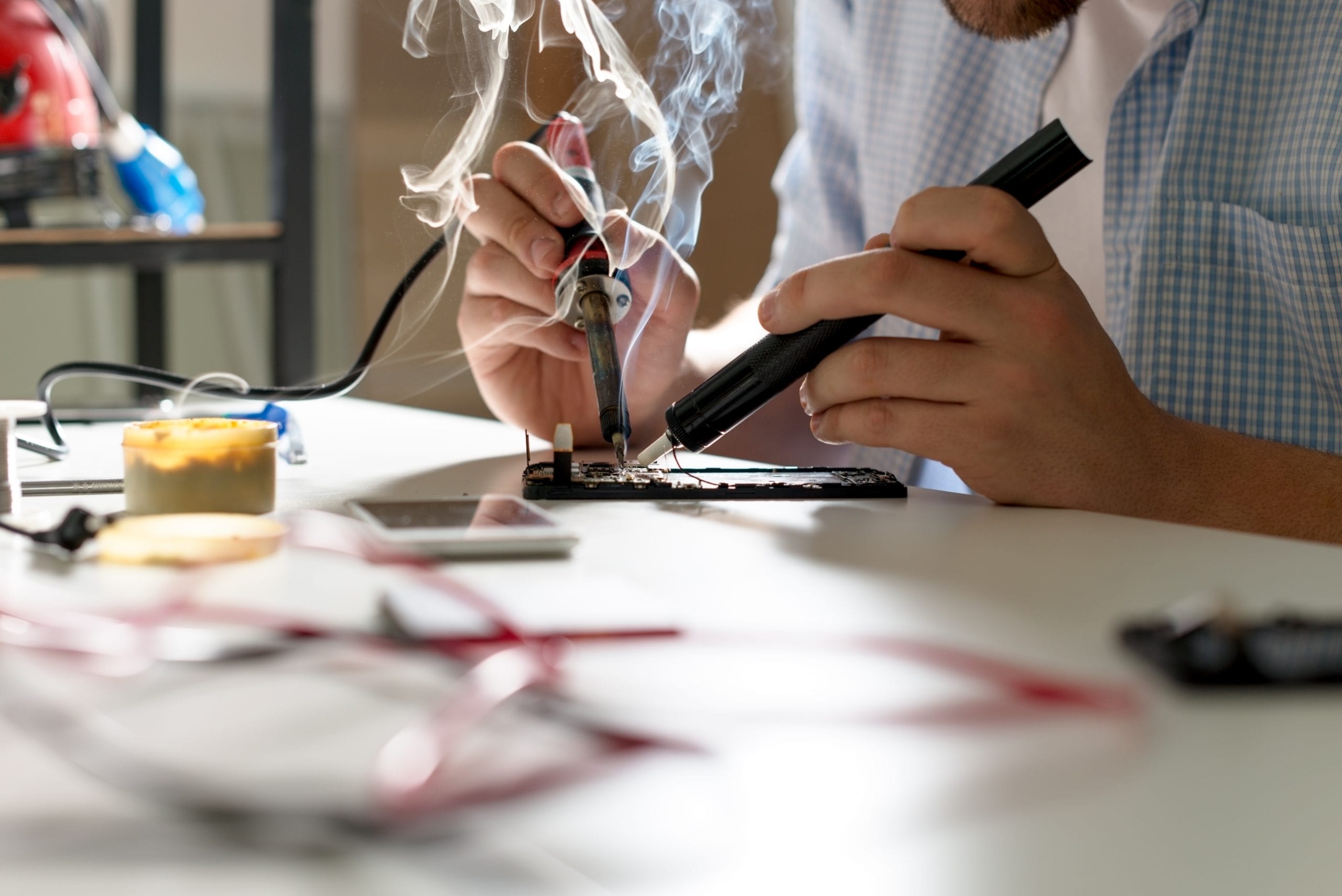 Employee Executing Hand soldering process